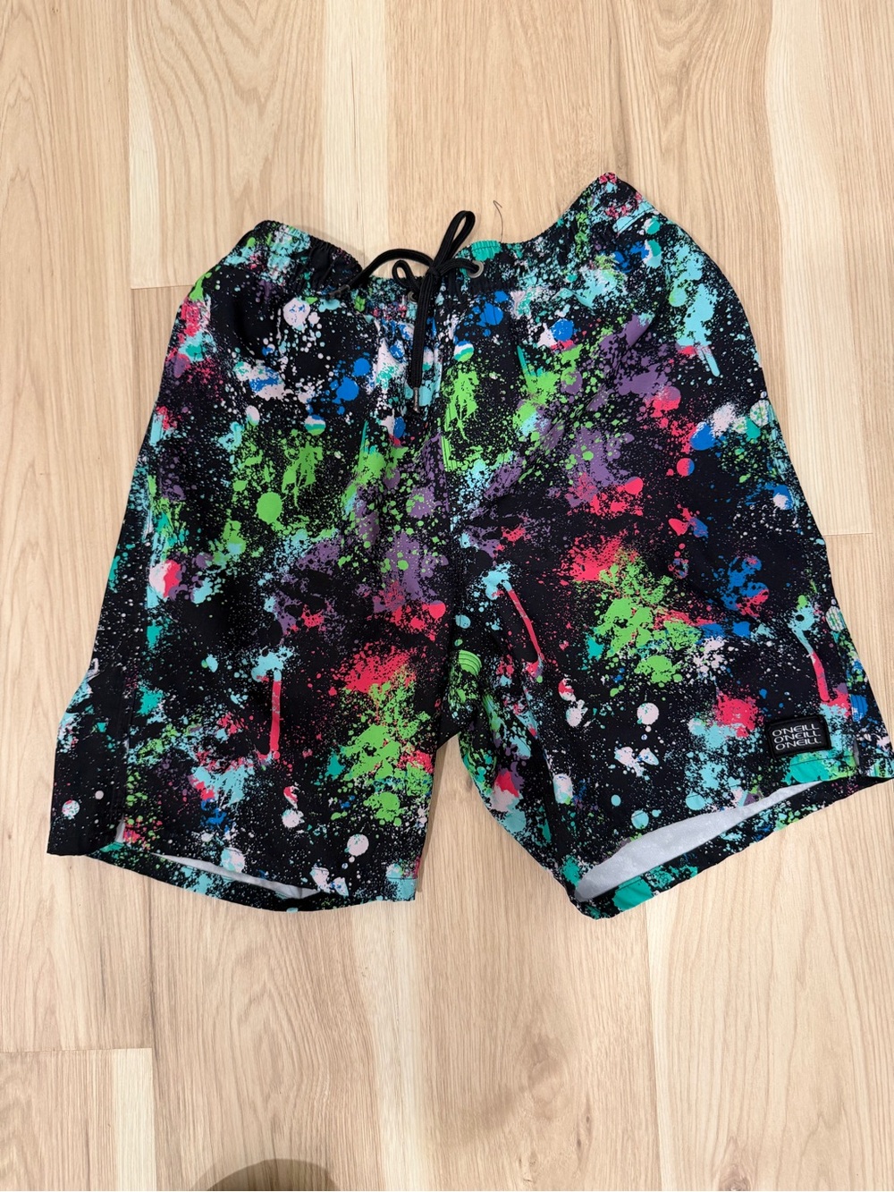O'Neill boys Black Swim Shorts with Neon Paint-Splatter
